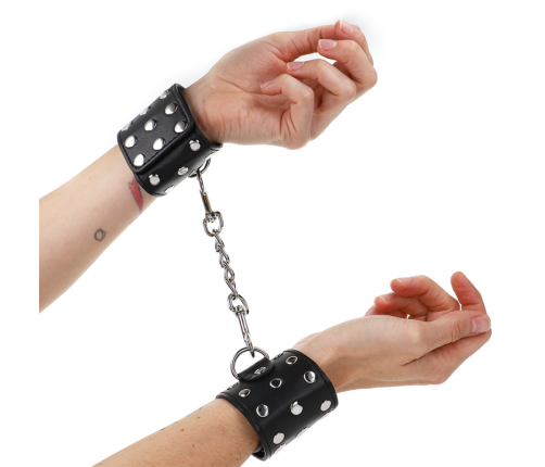 KINK - WRIST RESTRAINTS WITH SNAP FASTEN FULL OF RIVETS BLACK ADJUSTABLE 19-24 CM X 5.5 CM